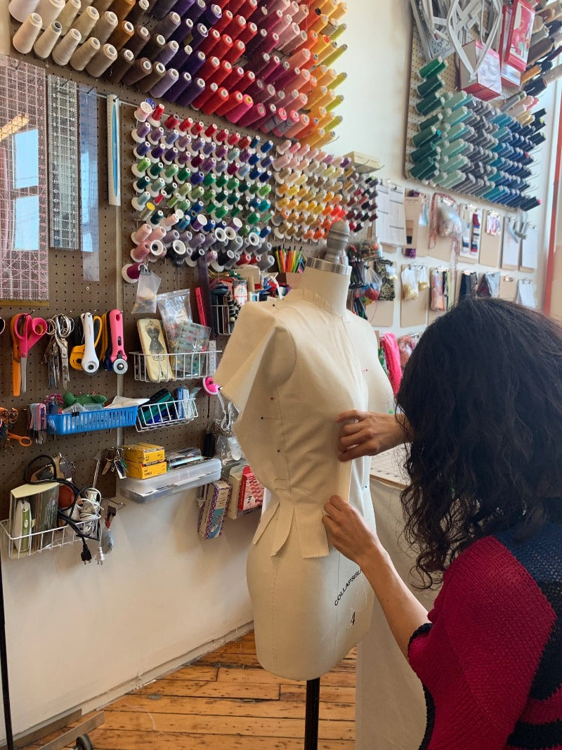 girl draping a bodice