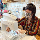 70s girl sewing