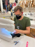 sexy man sewing