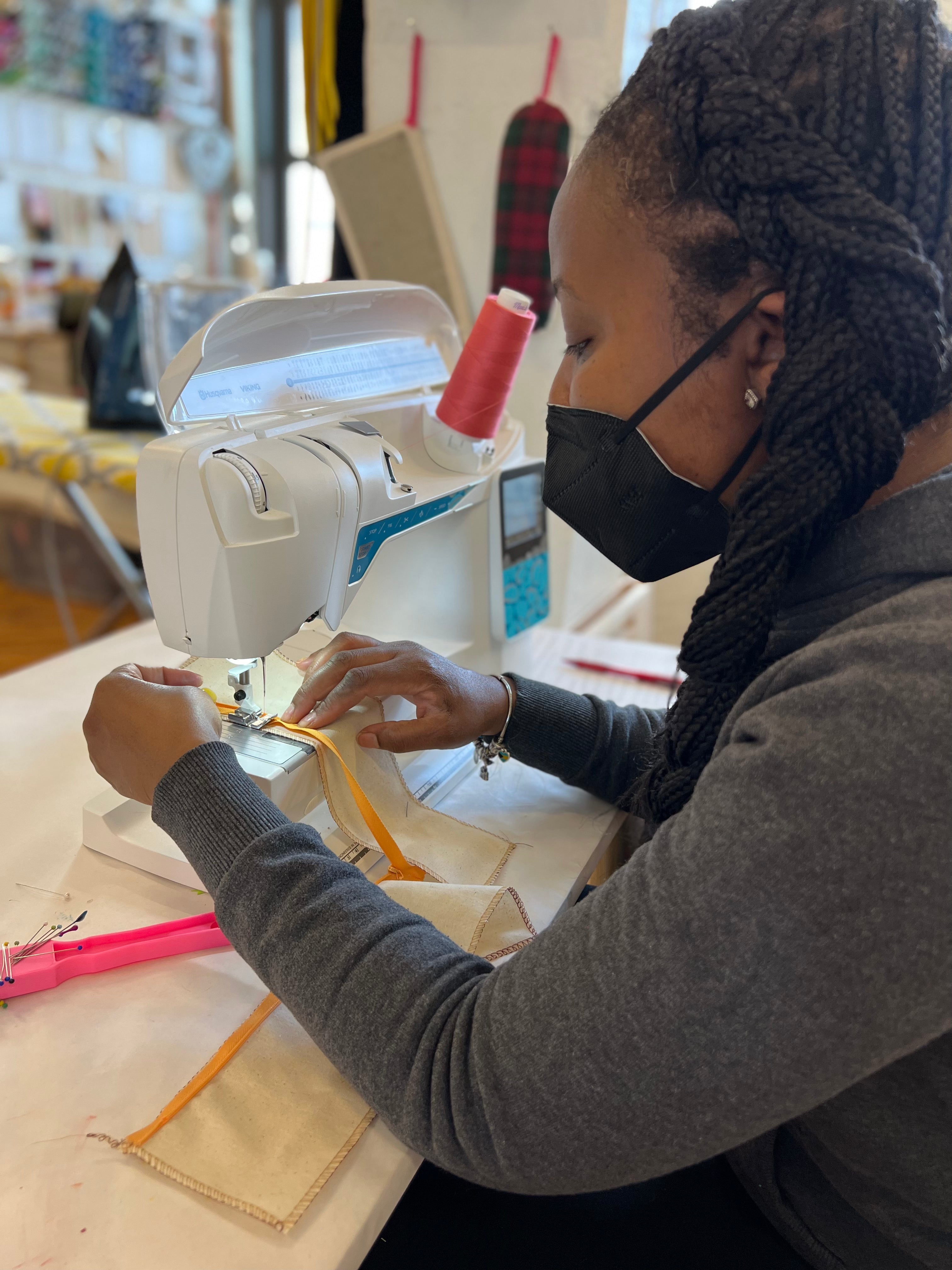 Girl sewing