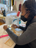 Girl sewing
