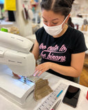 girl sewing