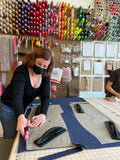 cutting out fabric in sewing class