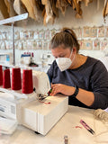 woman using serger