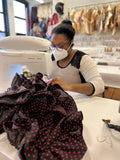 girl sewing a dress at sew anastasia