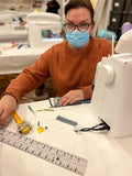 lady at sewing machine